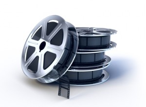 Stack of movie films spool with film